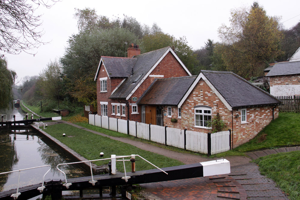 Brick walls, clay tile clad pitched roof